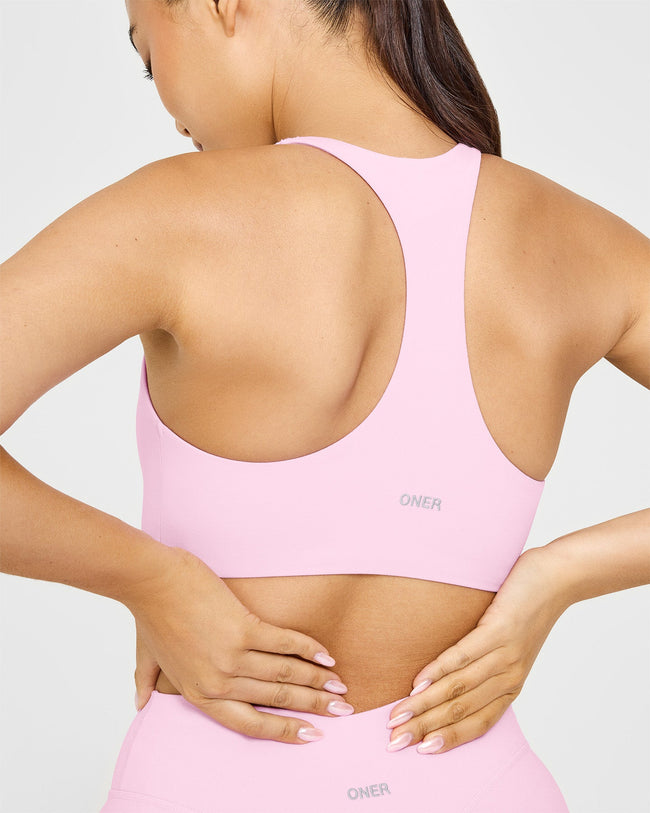 SoftMotion™ Sports Bra with White Logo | Chalk Pink