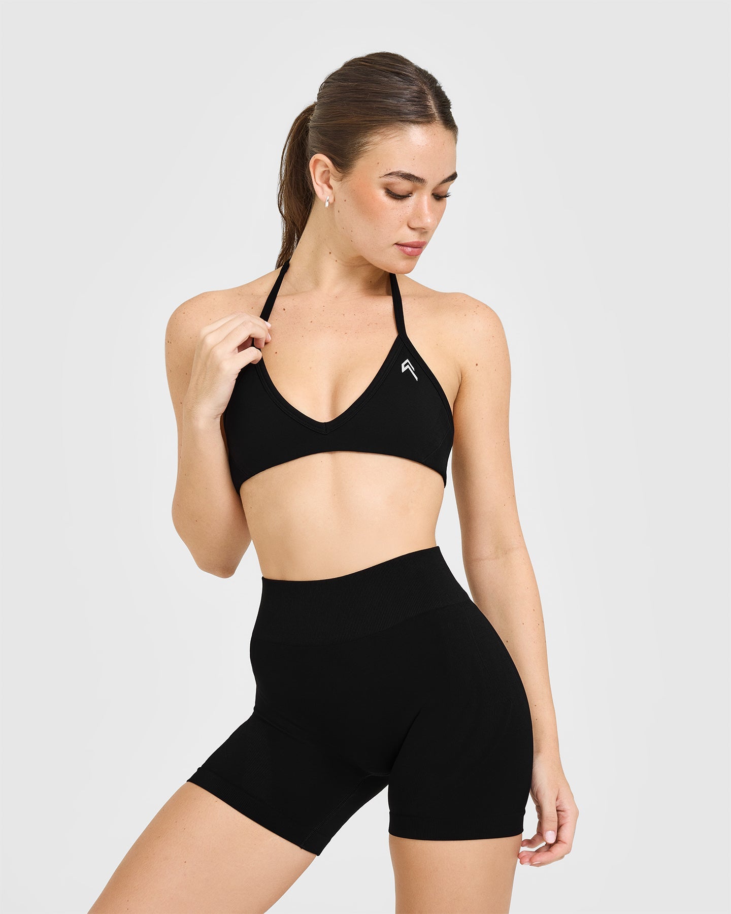 EnhanceLiftâ„¢ Seamless Minimal Halter Neck Bralette with White Logo | Black