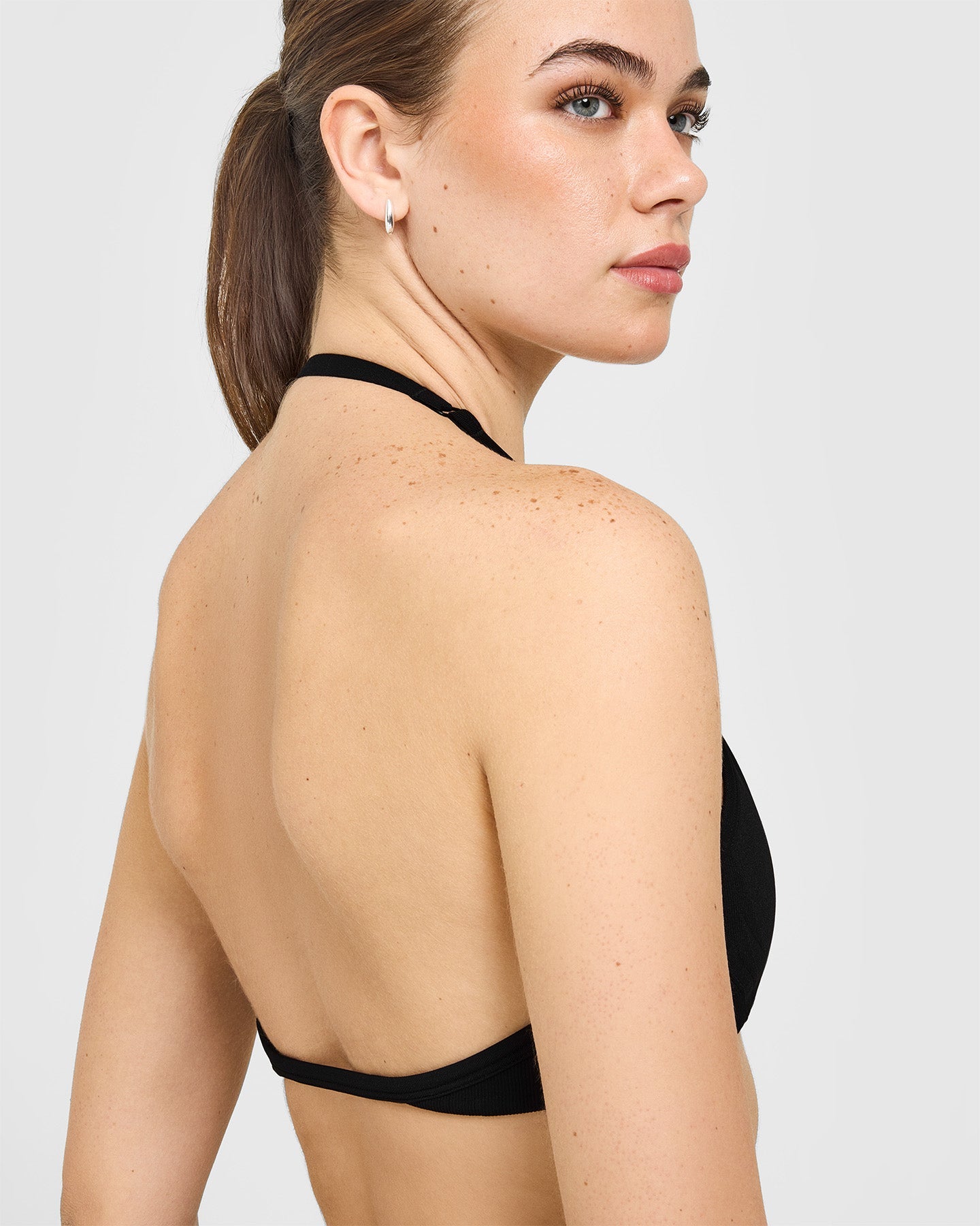 EnhanceLiftâ„¢ Seamless Minimal Halter Neck Bralette with White Logo | Black