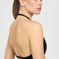 EnhanceLiftâ„¢ Seamless Minimal Halter Neck Bralette with White Logo | Black