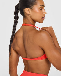 EnhanceLiftâ„¢ Seamless Minimal Halter Neck Bralette with White Logo | Charged Coral