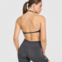 EnhanceLiftâ„¢ Seamless Minimal Halter Neck Bralette with White Logo | Coal
