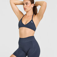 EnhanceLiftâ„¢ Seamless Minimal Halter Neck Bralette with White Logo | True Blue