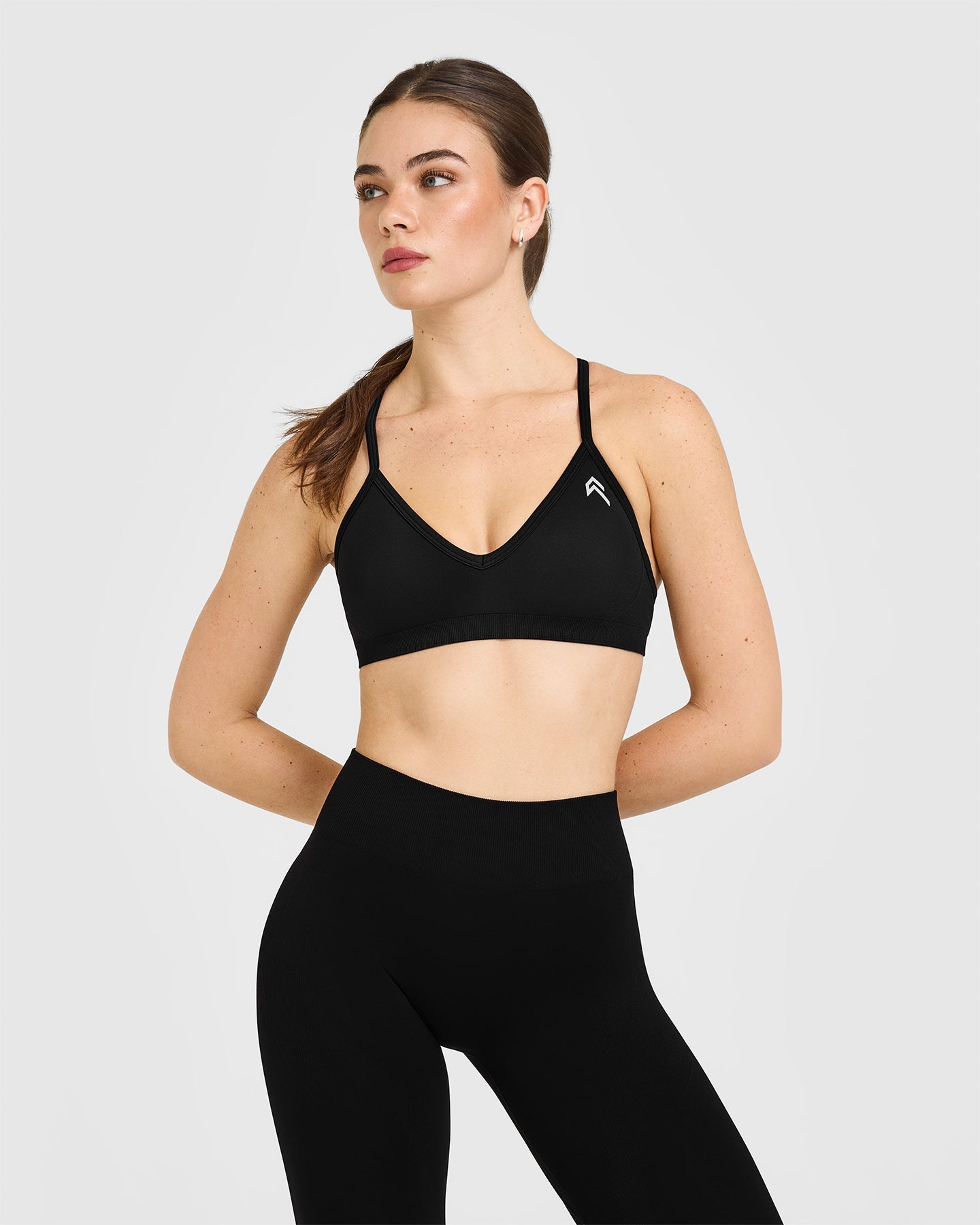 EnhanceLiftâ„¢ Seamless Strappy Sports Bra with White Logo | Black
