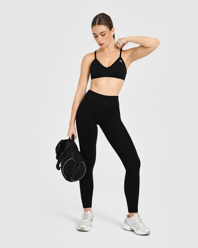 EnhanceLiftâ„¢ Seamless Strappy Sports Bra with White Logo | Black