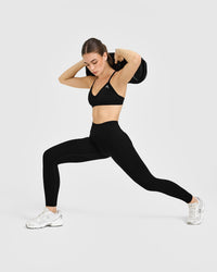 EnhanceLiftâ„¢ Seamless Strappy Sports Bra with White Logo | Black
