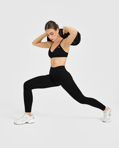 EnhanceLiftâ„¢ Seamless Strappy Sports Bra with White Logo | Black
