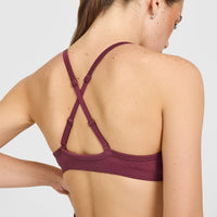EnhanceLiftâ„¢ Seamless Strappy Sports Bra with White Logo | Burnt Maroon