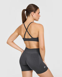 EnhanceLiftâ„¢ Seamless Strappy Sports Bra with White Logo | Coal