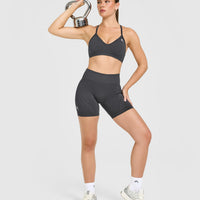 EnhanceLiftâ„¢ Seamless Strappy Sports Bra with White Logo | Coal