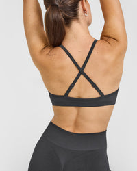 EnhanceLiftâ„¢ Seamless Strappy Sports Bra with White Logo | Coal
