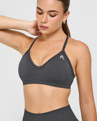 EnhanceLiftâ„¢ Seamless Strappy Sports Bra with White Logo | Coal