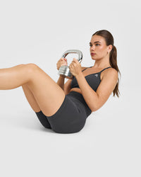 EnhanceLiftâ„¢ Seamless Strappy Sports Bra with White Logo | Coal