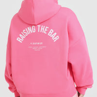 Raising the Bar Graphic Unisex Oversized Hoodie | Peony Pink