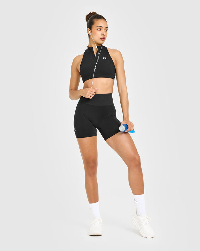 EasyLiftâ„¢ Zip High Neck Sports Bra with White Logo | Black