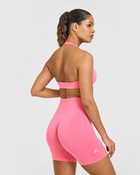 Effortless Seamless Halter Neck Sports Bra with White Logo | Peony Pink