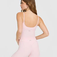 SoftMotion™ Strappy Mid Vest with Built in Bra Shelf with White Logo | Ballet Pink