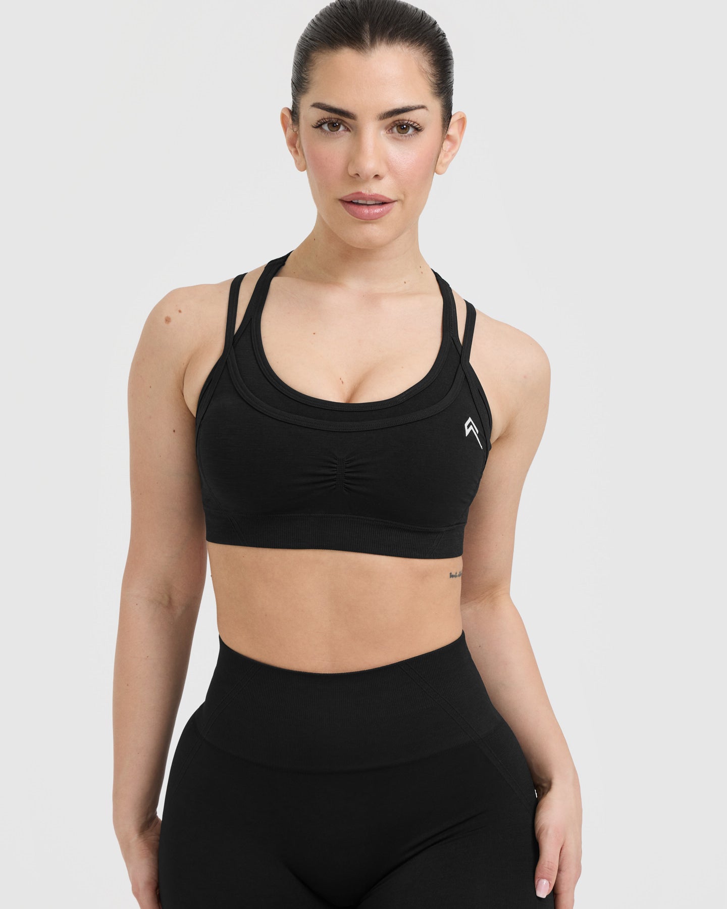 Effortless Seamless Layered Sports Bra with White Logo | Black
