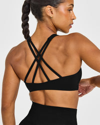 EasyLiftâ„¢ High Neck Sports Bra with White Logo | Black