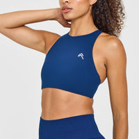 EasyLiftâ„¢ High Neck Sports Bra with White Logo | Midnight