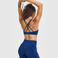 EasyLiftâ„¢ High Neck Sports Bra with White Logo | Midnight