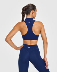 EasyLiftâ„¢ Zip High Neck Sports Bra with White Logo | Midnight