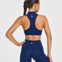 EasyLiftâ„¢ Zip High Neck Sports Bra with White Logo | Midnight