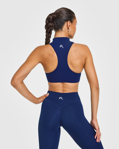 EasyLiftâ„¢ Zip High Neck Sports Bra with White Logo | Midnight