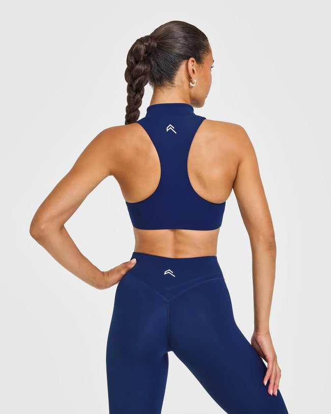 EasyLiftâ„¢ Zip High Neck Sports Bra with White Logo | Midnight