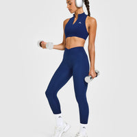 EasyLiftâ„¢ Zip High Neck Sports Bra with White Logo | Midnight