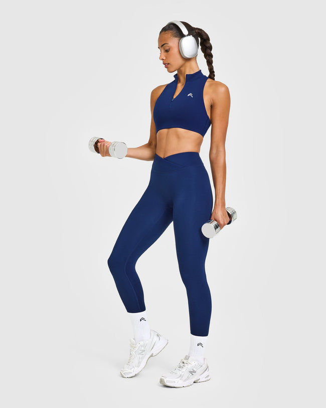 EasyLiftâ„¢ Zip High Neck Sports Bra with White Logo | Midnight