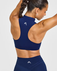 EasyLiftâ„¢ Zip High Neck Sports Bra with White Logo | Midnight