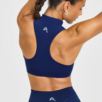 EasyLiftâ„¢ Zip High Neck Sports Bra with White Logo | Midnight