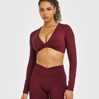 Unified Twist Front Long Sleeve Crop Top White Logo | Rosewood
