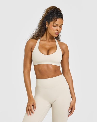 SoftMotionâ„¢ Bralette with White Logo | Sand