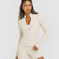 SoftMotionâ„¢ Jacket with White Logo | Sand