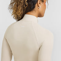 SoftMotionâ„¢ Jacket with White Logo | Sand