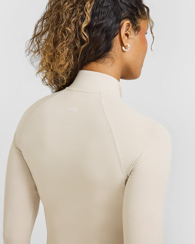 SoftMotionâ„¢ Jacket with White Logo | Sand