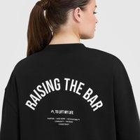 Raising The Bar Graphic Longline T-Shirt | Black