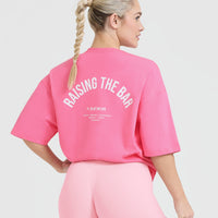 Raising The Bar Graphic Unisex T-Shirt | Peony Pink