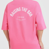 Raising The Bar Graphic Unisex T-Shirt | Peony Pink