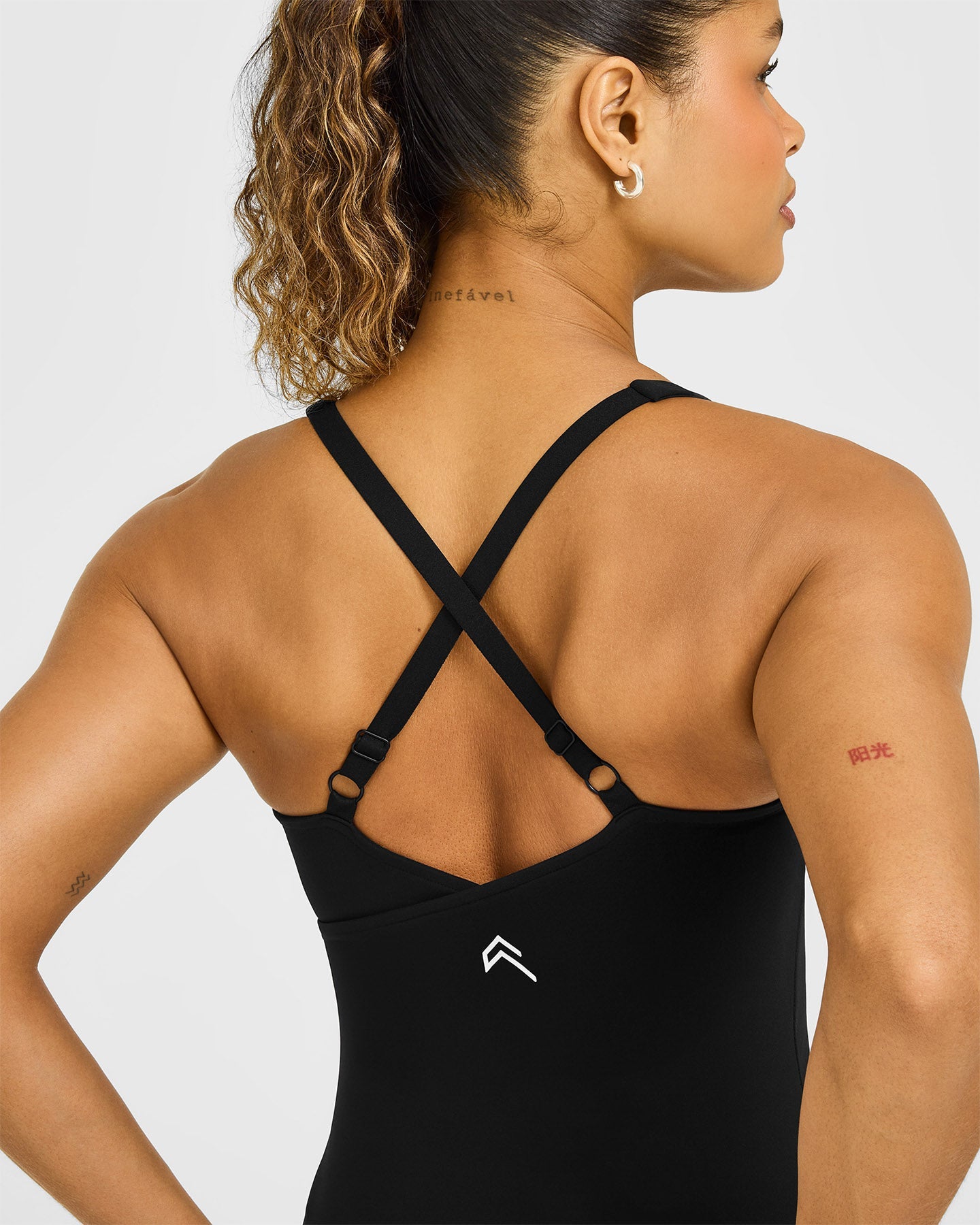 Unified V Neck Cross Back Vest White Logo | Black