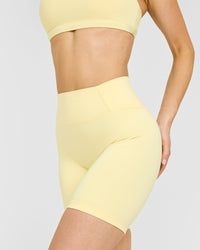 Timeless High Waisted Shorts with White Logo | Sherbert Yellow