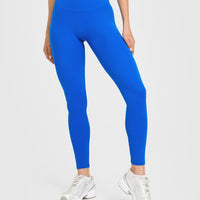 SoftMotion™ High Waisted Leggings with White Logo | Light Cobalt Blue