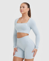 Effortless Square Neck Crop Long Sleeve Top with White Logo | Ice Blue