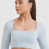 Effortless Square Neck Crop Long Sleeve Top with White Logo | Ice Blue