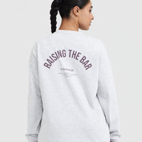 Raising The Bar Graphic Unisex Long Sleeve Top | Light Grey Marl