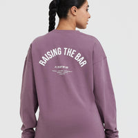 Raising The Bar Graphic Unisex Long Sleeve Top | Vintage Purple