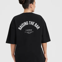 Raising The Bar Graphic Unisex T-Shirt | Black