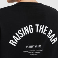 Raising The Bar Graphic Unisex T-Shirt | Black